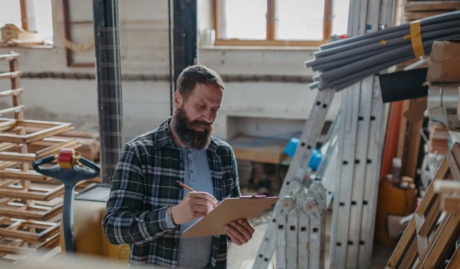 a carpenter in his workshop used on a blog about what insurance does a sole trader need?