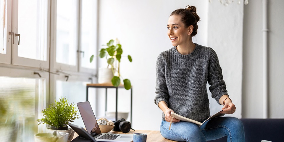 young female freelancer researching insurance options